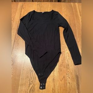 Black long sleeve body suit